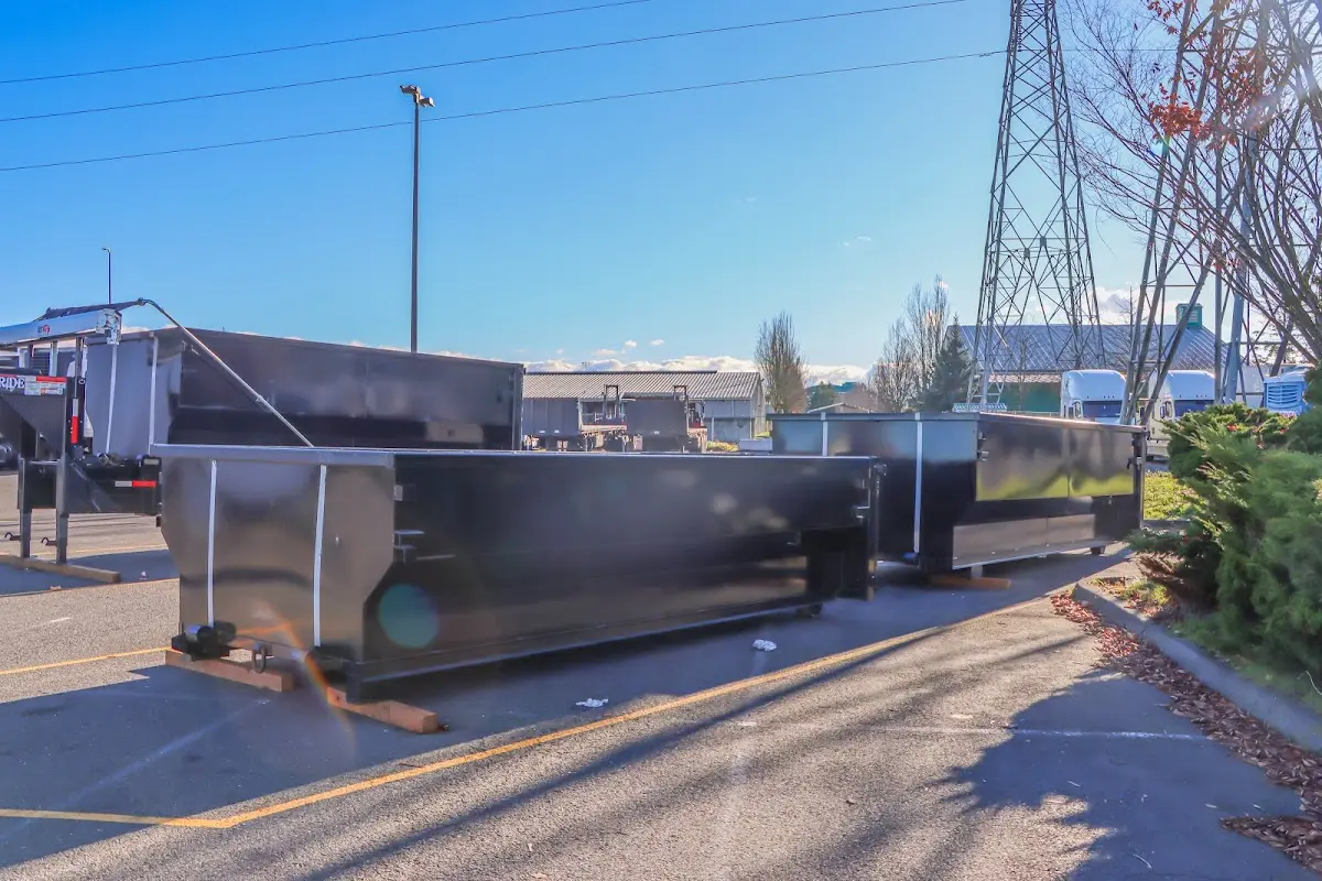 Roll-off dumpster ready for waste disposal at job site for 12 Yard Dumpster Rental in Mapleton